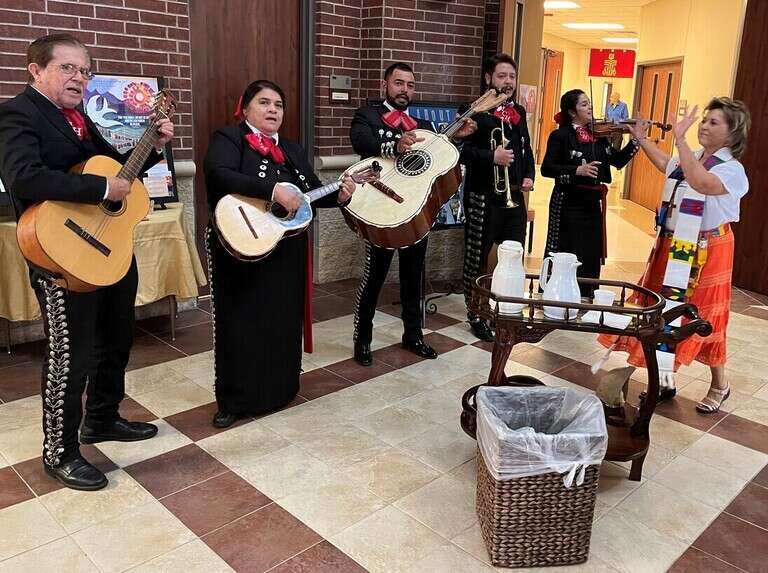 Cabrales Family Mariachi Band performing after church services