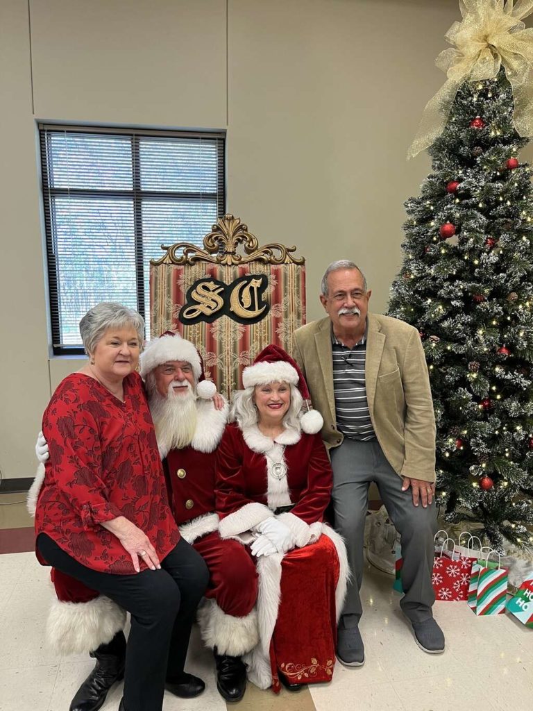 DiAnne and Mike with Santa