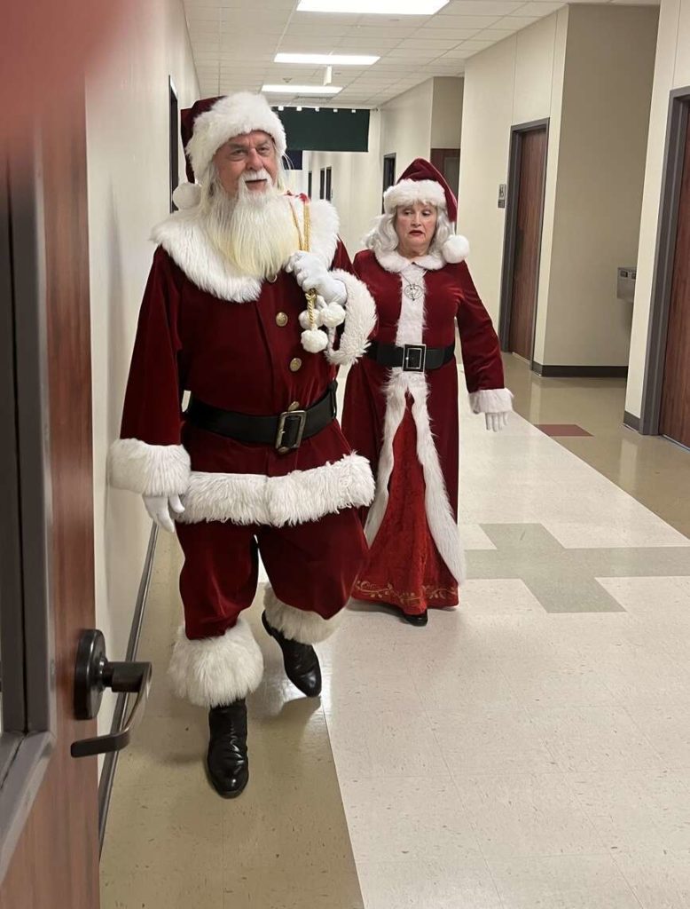 Here comes Mr and Mrs Santa Claus