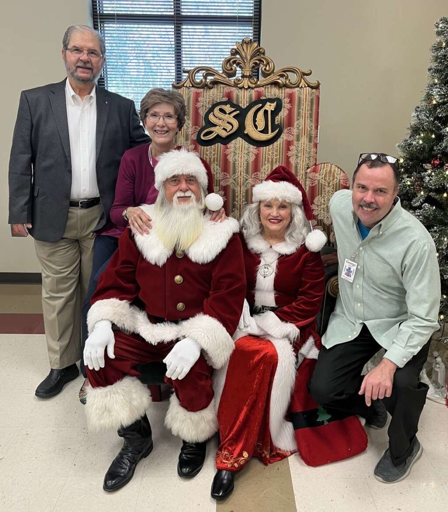 Len, Sarah, and George with Santa