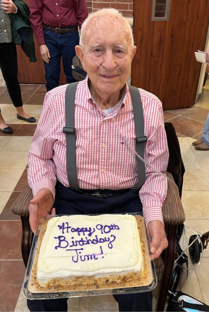 90 year old Jim Hutchison with birthday cake